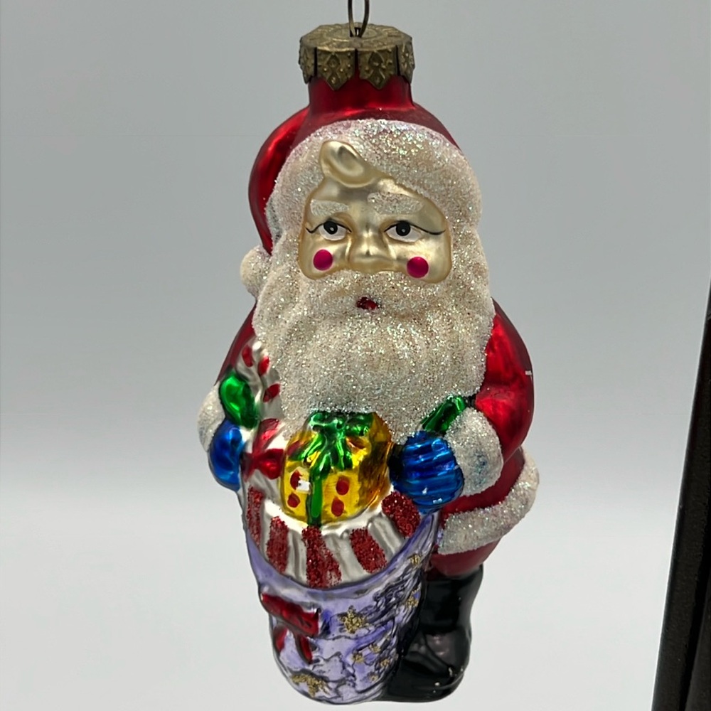 Vintage hand painted glass Santa Claus Christmas ornament holding bag